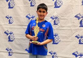  Student with Chess trophy