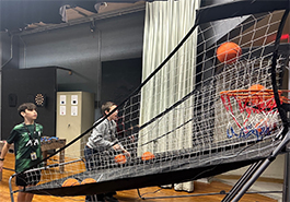  Davis students shooting baskets