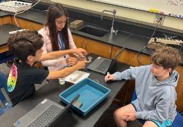  Malow students conduct a bath bomb experiment 